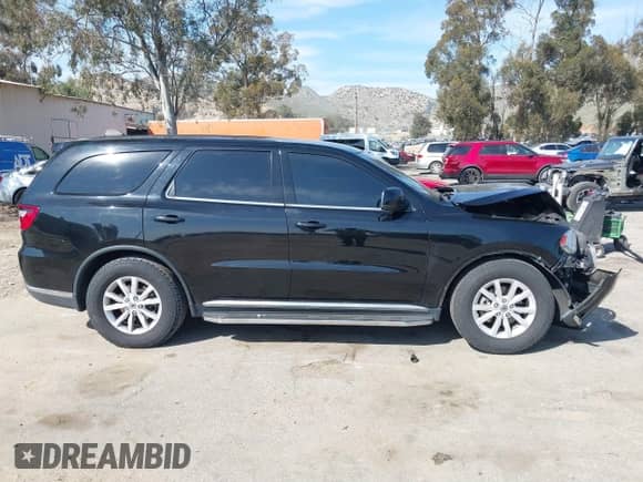 2020 Dodge Durango SXT with VIN 1C4RDHAGXLC100311, listed as a IAAI auction lot 41882904 with 107,974 mi miles and . Bid and sale history available at DreamBid. Image 12.