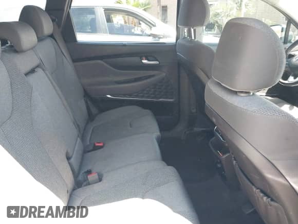 2019 Hyundai Santa Fe SEL Plus with VIN 5NMS33AD6KH099865, listed as a IAAI auction lot 42007106 with 103,095 mi miles and . Bid and sale history available at DreamBid. Image 8.