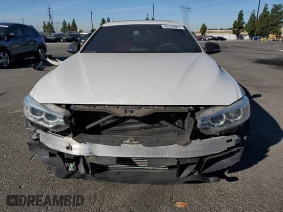 2015 BMW 4 Series 428i z VIN WBA4A9C58FGL85766, wystawiony jako Copart lot #69790975 z przebiegiem 93 413 mil mil oraz Szkoda całkowita • Salvage title. Historia ofert i sprzedaży dostępna na DreamBid. Obrazek 5.