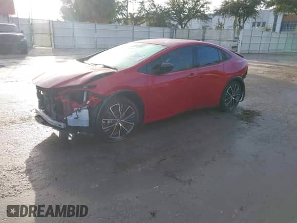 2024 Toyota Prius LE with VIN JTDACAAU7R3023449, listed as a IAAI auction lot 43136259 with 31,158 mi miles and . Bid and sale history available at DreamBid. Image 2.