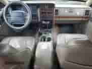 1995 Jeep Grand Cherokee Limited с VIN 1J4GZ78S7SC678078, выставлен на аукционе Copart как лот 52203834 с пробегом 269 423 миль миль и Списание • Salvage title. История ставок и продаж доступна на DreamBid. Изображение 8.