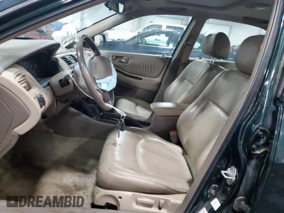 1998 Honda Accord EX with VIN 1HGCG1659WA023184, listed as a Copart auction lot 63247425 with 194,320 mi miles and Salvage title. Bid and sale history available at DreamBid. Image 7.