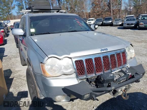 2009 Jeep Grand Cherokee with VIN 1J8HR68T39C540795, listed as a IAAI auction lot 41379112 with 236,624 mi miles and . Bid and sale history available at DreamBid. Image 1.