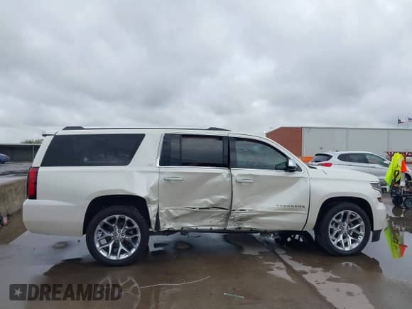 2015 Chevrolet Suburban LTZ с VIN 1GNSKKKC5FR734487, выставлен на аукционе IAAI как лот 43300616 с пробегом 63 795 миль миль и . История ставок и продаж доступна на DreamBid. Изображение 14.