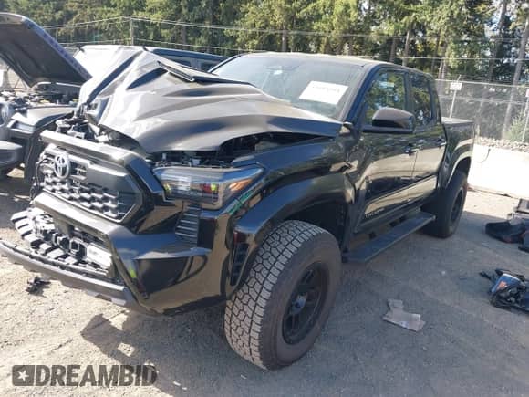 2024 Toyota Tacoma SR5 with VIN 3TMLB5JN4RM080833, listed as a IAAI auction lot 43404104 with 19,266 mi miles and . Bid and sale history available at DreamBid. Image 18.