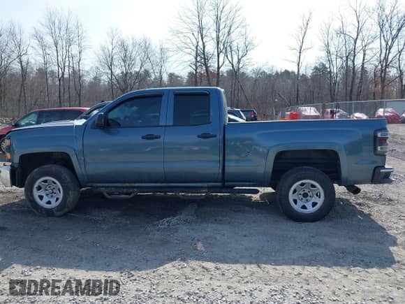 2014 Chevrolet Silverado 1500 Work Truck z VIN 1GCVKPEC8EZ140750, wystawiony jako IAAI lot #41751347 z przebiegiem 143 346 mil mil oraz . Historia ofert i sprzedaży dostępna na DreamBid. Obrazek 13.