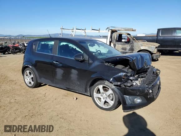 2012 Chevrolet Sonic LTZ with VIN 1G1JE6SH5C4195594, listed as a Copart auction lot 88336435 with 105,112 mi miles and Salvage title. Bid and sale history available at DreamBid. Image 4.