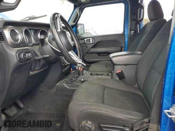 2021 Jeep Wrangler Unlimited Sahara High Altitude with VIN 1C4HJXEM3MW770622, listed as a Copart auction lot 76144874 with 71,886 mi miles and Salvage title. Bid and sale history available at DreamBid. Image 7.