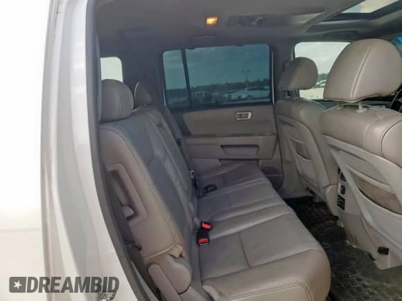2011 Honda Pilot Touring с VIN 5FNYF3H98BB029742, выставлен на аукционе Copart как лот 70890845 с пробегом 222 211 миль миль и Списание • Salvage title. История ставок и продаж доступна на DreamBid. Изображение 11.