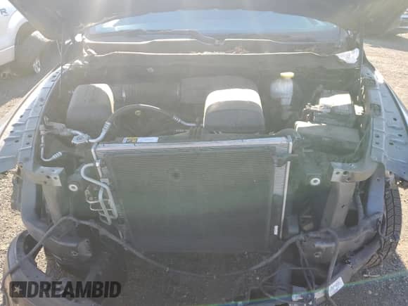 2018 Ram 1500 Tradesman z VIN 1C6RR6FG9JS229598, wystawiony jako Copart lot #70298915 z przebiegiem 99 942 mil mil oraz Szkoda całkowita • Salvage title. Historia ofert i sprzedaży dostępna na DreamBid. Obrazek 11.