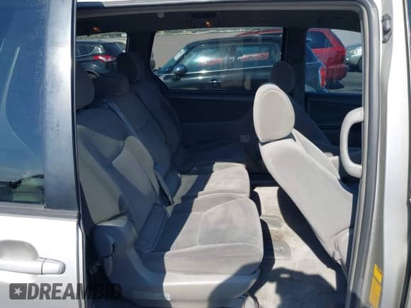 2005 Toyota Sienna CE with VIN 5TDZA23CX5S288782, listed as a IAAI auction lot 42991430 with 220,506 mi miles and . Bid and sale history available at DreamBid. Image 8.