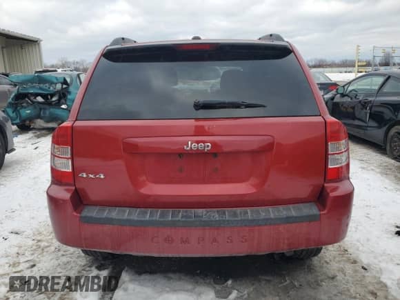 2010 Jeep Compass Latitude z VIN 1J4NF1FB0AD623710, wystawiony jako Copart lot #88657615 z przebiegiem Nie podano mil oraz Szkoda całkowita • Salvage title. Historia ofert i sprzedaży dostępna na DreamBid. Obrazek 6.