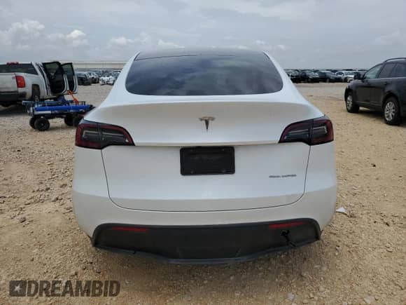 2023 Tesla Model Y Long Range with VIN 7SAYGDEE8PA067712, listed as a Copart auction lot 63824464 with 30,863 mi miles and Salvage title. Bid and sale history available at DreamBid. Image 6.