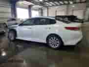 2016 Kia Optima EX with VIN 5XXGU4L36GG056307, listed as a Copart auction lot 63011895 with 69,738 mi miles and Salvage title. Bid and sale history available at DreamBid. Image 2.