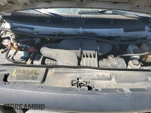 2012 Ford Econoline Cargo Commercial with VIN 1FTNE1EW2CDB34452, listed as a Copart auction lot 66587925 with 212,296 mi miles and Clean title. Bid and sale history available at DreamBid. Image 12.