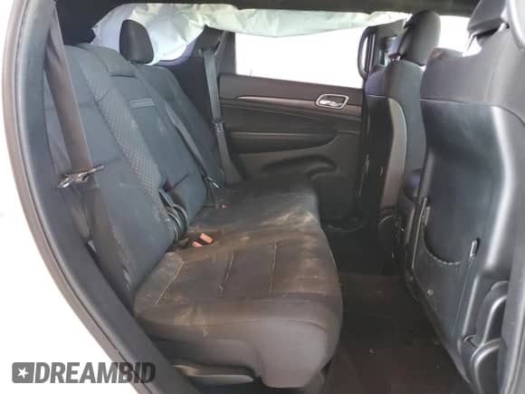 2018 Jeep Grand Cherokee Laredo z VIN 1C4RJEAG7JC480700, wystawiony jako Copart lot #56788835 z przebiegiem Nie podano mil oraz Szkoda całkowita • Salvage title. Historia ofert i sprzedaży dostępna na DreamBid. Obrazek 11.