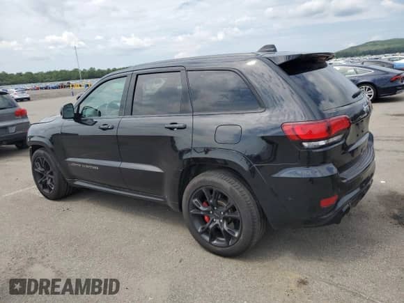 2017 Jeep Grand Cherokee SRT с VIN 1C4RJFDJ2HC822710, выставлен на аукционе Copart как лот 68834355 с пробегом 103 517 миль миль и Списание • Salvage title. История ставок и продаж доступна на DreamBid. Изображение 2.