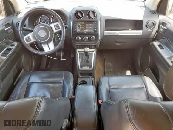 2016 Jeep Compass Latitude with VIN 1C4NJDEB8GD557522, listed as a Copart auction lot 67559545 with 134,039 mi miles and Salvage title. Bid and sale history available at DreamBid. Image 8.