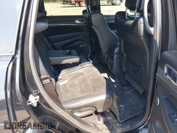 2017 Jeep Grand Cherokee SRT z VIN 1C4RJFDJXHC955764, wystawiony jako IAAI lot #42987636 z przebiegiem 103 832 mil mil oraz . Historia ofert i sprzedaży dostępna na DreamBid. Obrazek 8.