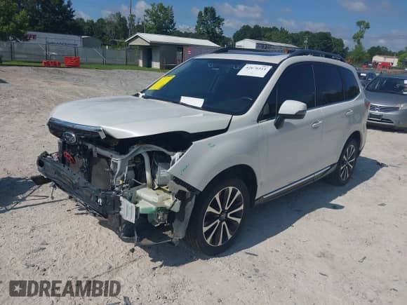 2017 Subaru Forester Touring z VIN JF2SJGWC6HH434017, wystawiony jako IAAI lot #42676511 z przebiegiem 110 981 mil mil oraz . Historia ofert i sprzedaży dostępna na DreamBid. Obrazek 19.