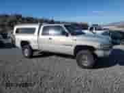 2001 Dodge 2500 with VIN 3B7KF23Z71G180443, listed as a Copart auction lot 82716745 with 353,149 mi miles and Clean title. Bid and sale history available at DreamBid. Image 4.