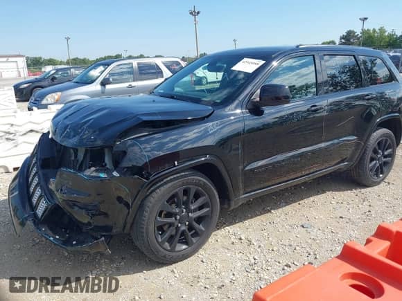 2017 Jeep Grand Cherokee Altitude with VIN 1C4RJFAG7HC792340, listed as a IAAI auction lot 42945088 with 143,122 mi miles and . Bid and sale history available at DreamBid. Image 2.