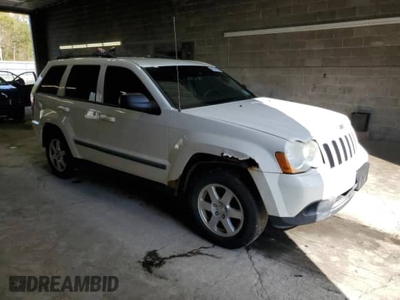 2009 Jeep Grand Cherokee Laredo with VIN 1J8GR48K09C536193, listed as a Copart auction lot 80574535 with Not provided miles and Salvage title. Bid and sale history available at DreamBid. Image 4.