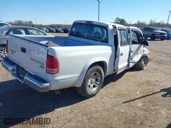 2004 Dodge Dakota SLT with VIN 1D7HL48K14S524636, listed as a IAAI auction lot 41389726 with 161,176 mi miles and . Bid and sale history available at DreamBid. Image 4.