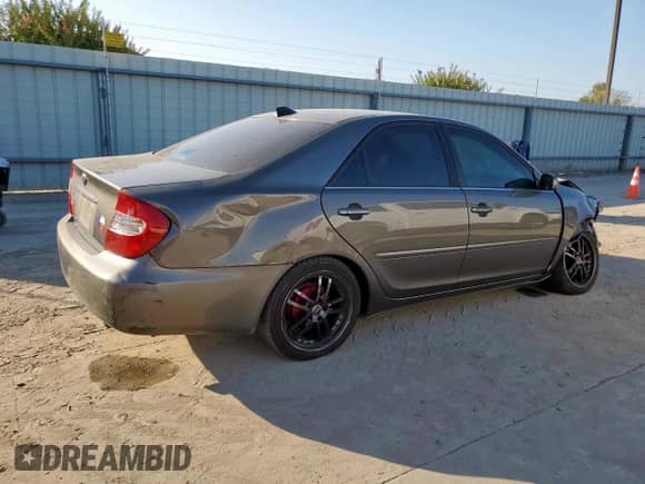 2004 Toyota Camry LE с VIN 4T1BE32K74U923371, выставлен на аукционе Copart как лот 82349615 с пробегом 211 248 миль миль и Списание • Salvage title. История ставок и продаж доступна на DreamBid. Изображение 3.