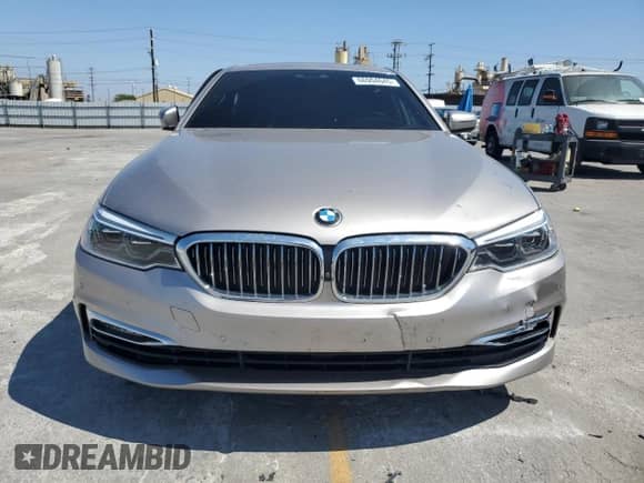 2018 BMW 5 Series 530i с VIN WBAJA5C54JWA38447, выставлен на аукционе Copart как лот 66904645 с пробегом Не указан миль и Списание • Salvage title. История ставок и продаж доступна на DreamBid. Изображение 5.