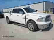 2014 Ram 1500 Laramie with VIN 1C6RR6NT0ES388966, listed as a Copart auction lot 59334475 with 302,512 mi miles and Salvage title. Bid and sale history available at DreamBid. Image 4.