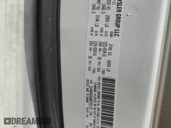 2011 Dodge Grand Caravan Express with VIN 2D4RN4DGXBR732137, listed as a Copart auction lot 62862055 with 115,694 mi miles and Salvage title. Bid and sale history available at DreamBid. Image 13.