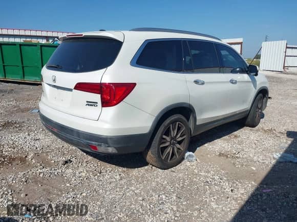 2017 Honda Pilot Touring with VIN 5FNYF6H94HB083565, listed as a IAAI auction lot 43341460 with 90,336 mi miles and . Bid and sale history available at DreamBid. Image 4.