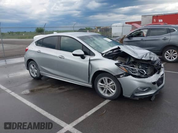 2018 Chevrolet Cruze LT with VIN 3G1BE6SM3JS649338, listed as a IAAI auction lot 42636914 with 113,195 mi miles and . Bid and sale history available at DreamBid. Image 1.