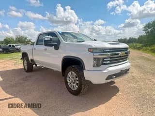 2020 Chevrolet Silverado 2500HD High Country z VIN 1GC4YREY0LF130469, wystawiony jako Copart lot #86672655 z przebiegiem 117 895 mil mil oraz Czysty tytuł • Clean title. Historia ofert i sprzedaży dostępna na DreamBid. Obrazek 1.