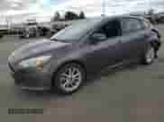 2015 Ford Focus SE with VIN 1FADP3K22FL294012, listed as a Copart auction lot 84920825 with 155,437 mi miles and Salvage title. Bid and sale history available at DreamBid. Image 1.