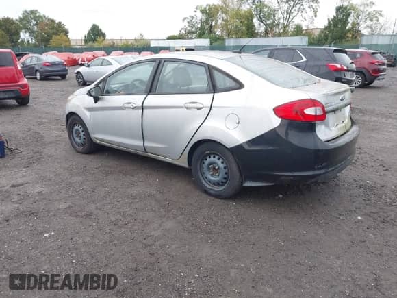 2013 Ford Fiesta S with VIN 3FADP4AJ7DM191498, listed as a IAAI auction lot 43445206 with 165,406 mi miles and . Bid and sale history available at DreamBid. Image 3.