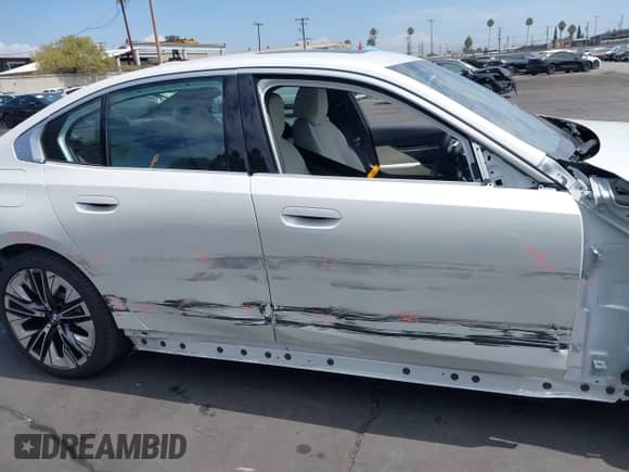 2024 BMW 5 Series 530i with VIN WBA43FJ06RCS61104, listed as a IAAI auction lot 43056084 with Not provided miles and . Bid and sale history available at DreamBid. Image 14.