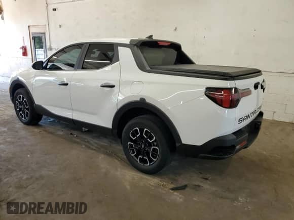 2022 Hyundai Santa Cruz SE с VIN 5NTJADAE2NH010656, выставлен на аукционе Copart как лот 66672185 с пробегом 57 802 миль миль и Списание • Salvage title. История ставок и продаж доступна на DreamBid. Изображение 2.