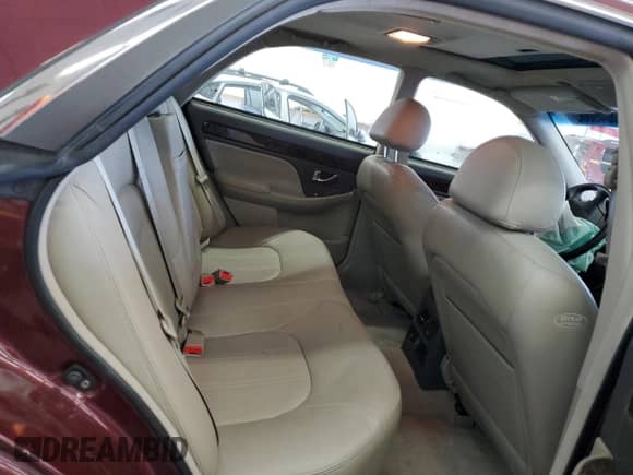 2003 Hyundai XG with VIN KMHFU45E53A237880, listed as a Copart auction lot 55049885 with 94,009 mi miles and Salvage title. Bid and sale history available at DreamBid. Image 10.