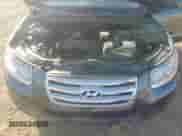 2012 Hyundai Santa Fe GLS z VIN 5XYZGDAB1CG092812, wystawiony jako Copart lot #84626635 z przebiegiem Nie podano mil oraz Szkoda całkowita • Salvage title. Historia ofert i sprzedaży dostępna na DreamBid. Obrazek 11.