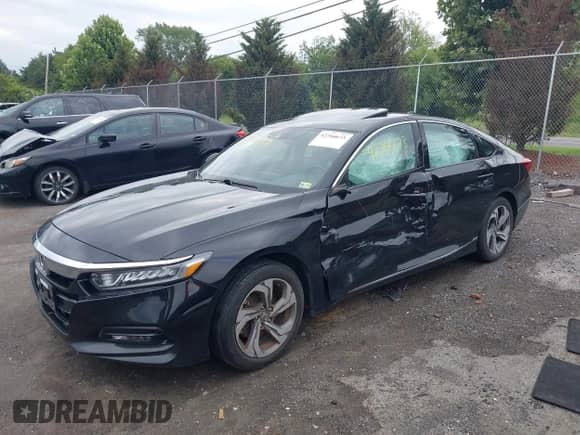 2018 Honda Accord EX-L with VIN 1HGCV2F58JA031605, listed as a IAAI auction lot 42766673 with Not provided miles and . Bid and sale history available at DreamBid. Image 2.