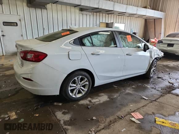 2019 Chevrolet Cruze LT с VIN 1G1BE5SM6K7116264, выставлен на аукционе Copart как лот 80685225 с пробегом 46 039 миль миль и На запчасти • Non repairable. История ставок и продаж доступна на DreamBid. Изображение 3.