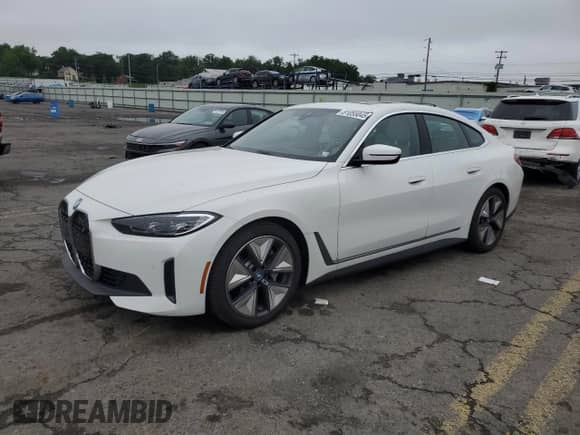 2024 BMW i4 xDrive40 с VIN WBY83FB04RFT01096, выставлен на аукционе Copart как лот 61055045 с пробегом 1 370 миль миль и Списание • Salvage title. История ставок и продаж доступна на DreamBid. Изображение 1.