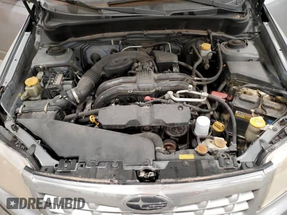 2012 Subaru Forester X Premium z VIN JF2SHBDC1CH461863, wystawiony jako Copart lot #82560625 z przebiegiem 203 261 mil mil oraz Czysty tytuł • Clean title. Historia ofert i sprzedaży dostępna na DreamBid. Obrazek 11.