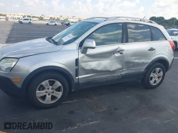 2014 Chevrolet Captiva Sport LS z VIN 3GNAL2EK5ES598269, wystawiony jako IAAI lot #43064207 z przebiegiem 173 719 mil mil oraz . Historia ofert i sprzedaży dostępna na DreamBid. Obrazek 6.