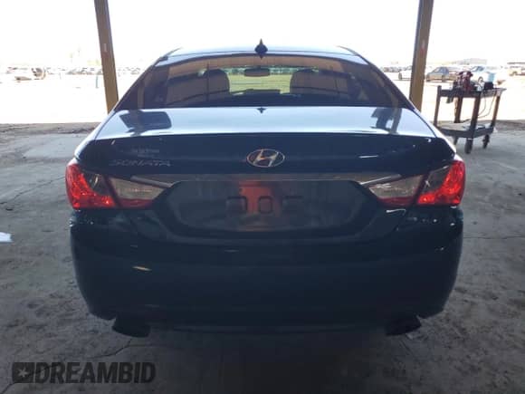 2013 Hyundai Sonata SE with VIN 5NPEC4AC0DH734210, listed as a Copart auction lot 86682685 with 128,143 mi miles and Salvage title. Bid and sale history available at DreamBid. Image 6.