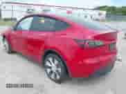 2023 Tesla Model Y Long Range with VIN 7SAYGAEE6PF777290, listed as a IAAI auction lot 43167431 with 19,758 mi miles and . Bid and sale history available at DreamBid. Image 3.