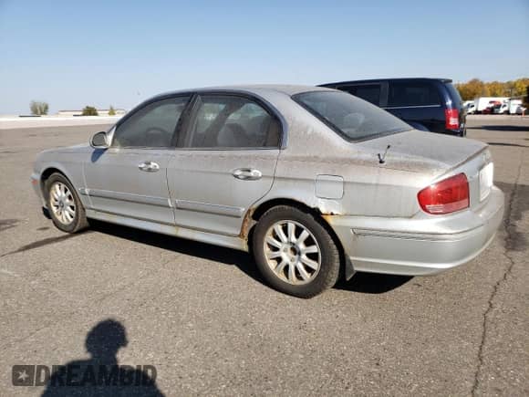 2003 Hyundai Sonata GLS z VIN KMHWF35H23A871372, wystawiony jako Copart lot #76199644 z przebiegiem 164 094 mil mil oraz Czysty tytuł • Clean title. Historia ofert i sprzedaży dostępna na DreamBid. Obrazek 2.