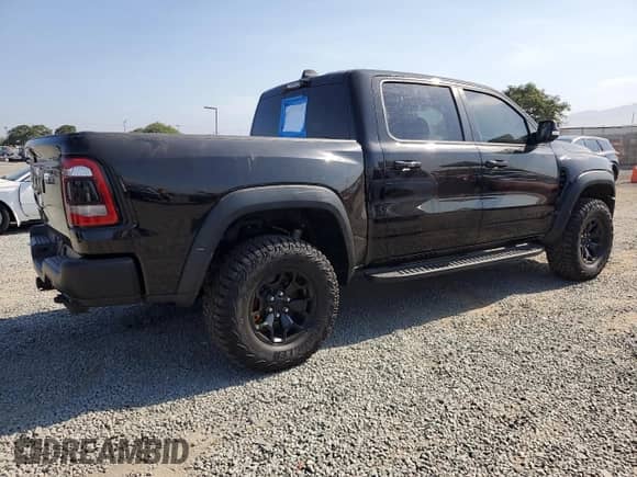 2022 Ram 1500 TRX z VIN 1C6SRFU96NN151419, wystawiony jako Copart lot #70125925 z przebiegiem 76 407 mil mil oraz Szkoda całkowita • Salvage title. Historia ofert i sprzedaży dostępna na DreamBid. Obrazek 3.